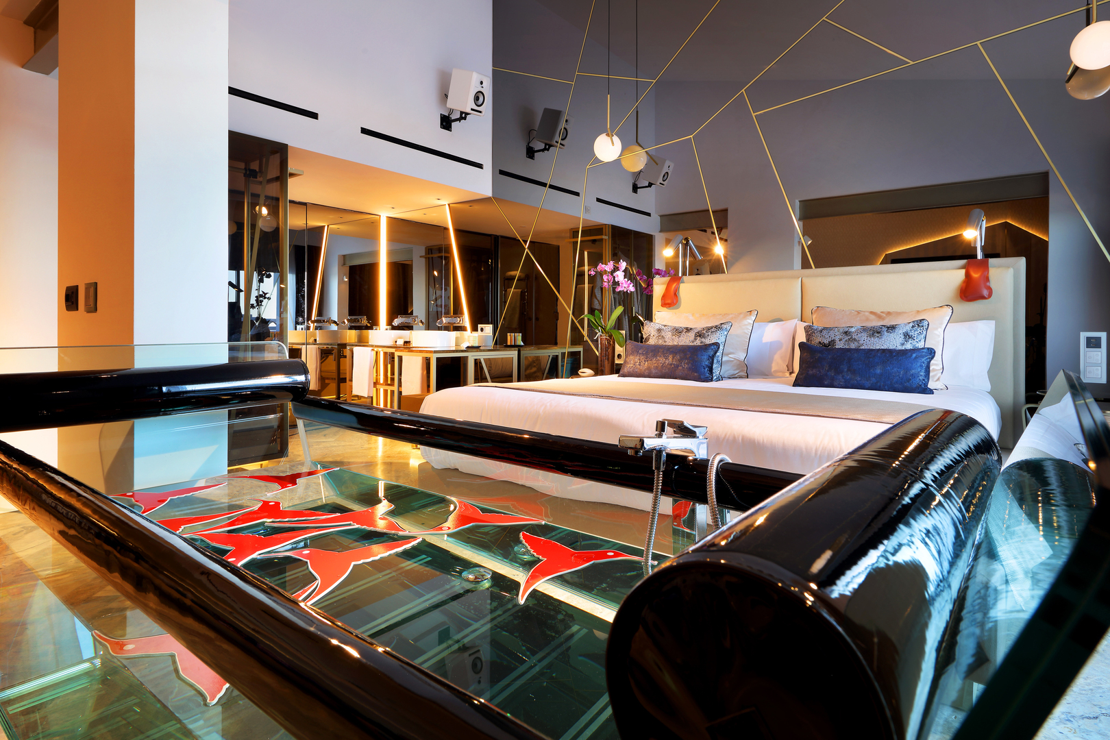 Neon lights and a pvc trimmed bath in a room at Ushuaia Ibiza Beach Hotel, one of the best hotels in Ibiza