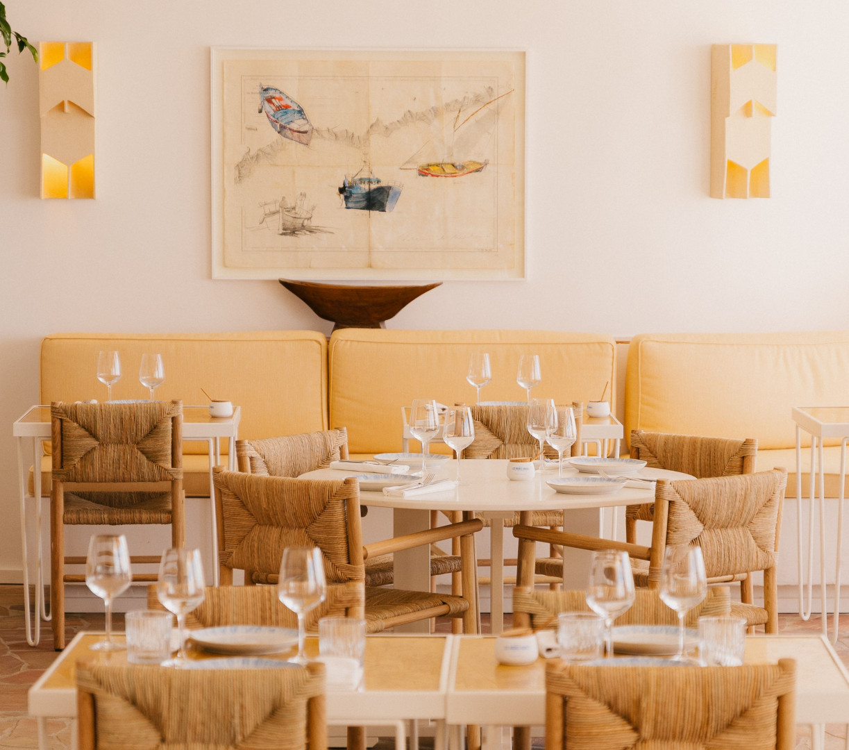 Hotel restaurant interior with tables and chairs.