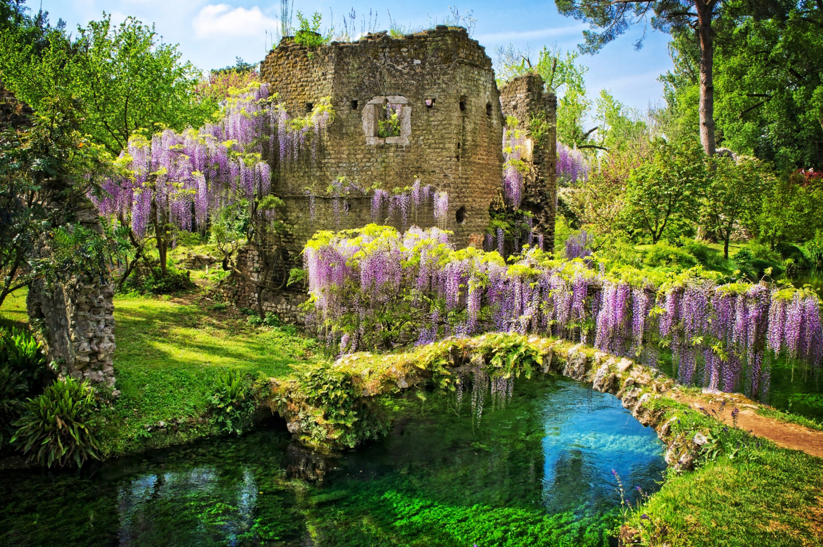 The beautiful garden landscape in Ninfa, an essential stop on Italian tours.